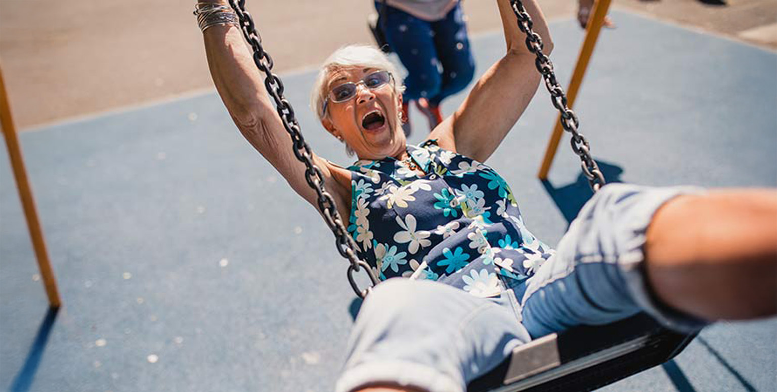 old woman on swing